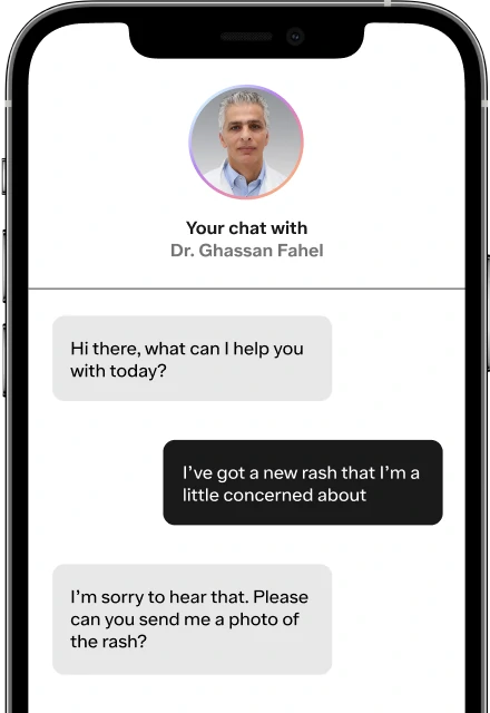 Phone screen presenting message thread between the patient and a Dr. Ghassan Fahel. The first message from a doctor says 'Hi there, what can I help you with today?', the response from the patient says 'I've got a new rash that I'm a little concerned about' and the last message from doctor says 'I'm sorry to hear that. Please can you send me a photo of the rash?'